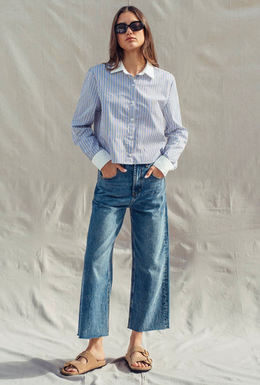 Relaxed fit of The Hampton Stripe Shirt paired with jeans.