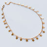Hilaria gold filled star necklace by Matte, celestial charm choker on white background