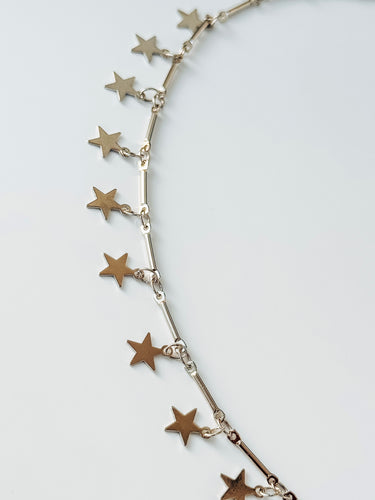 Hilaria silver filled star necklace by Matte, celestial charm choker on white background