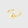 Gold ring with a spherical design on a light gray background