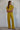 Ithaca Pant olive mustard ribbed knit wide-leg pants styled with matching top.