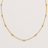 Jazmine Necklace featuring a delicate 18-inch gold-filled chain with polished elongated station bead accents evenly spaced throughout.