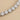 Joric Necklace close-up detail of sparkling simulated diamond tennis necklace setting.