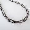 Close-up of Jules necklace by Matte showing enamel gold filled chain detail—sleek and refined