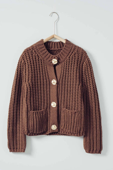 Flat lay of the Jutmy brown knit cardigan highlighting the chunky knit texture, gold-tone buttons, and front patch pockets.