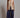 Kaia Vest beige longline tailored vest styled with relaxed navy trousers.