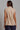 Kaia Vest back view of beige sleeveless tailored vest.