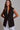 Kaia Vest black sleeveless vest featuring structured lapels and tailored silhouette.