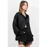 Front view of the Kayden oversized black blouse.