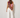 Kirby Top asymmetrical floral print statement top with fringe detailing back view.
