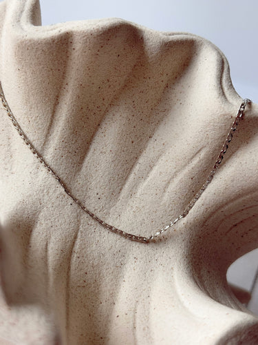 Landing silver chain necklace by Matte, flat chain displayed on neutral background