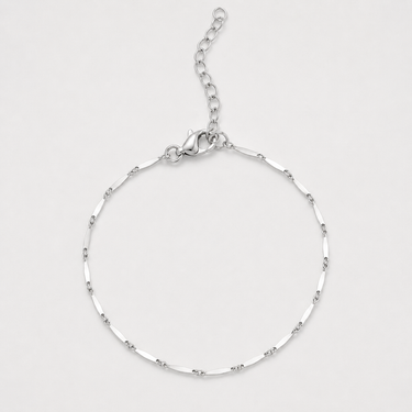 Lindon Bracelet in silver featuring a delicate textured chain with an adjustable extender clasp.