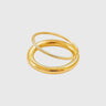 Gold ring with three interlocking bands on a light gray background by Matte Jewelry