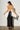 Back view of the Lumit balloon pants highlighting the gathered hem, comfortable fit, and fluid drape.