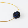 Luna Negra Pavé Necklace by Matte, gold chain with blue pavé gemstone bead