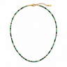 Lunne Necklace green beaded necklace with black accents and gold clasp on neutral background showing delicate strand design.