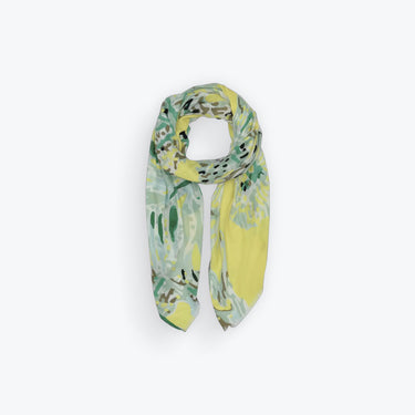 Matera Sarong displayed folded showing artistic brushstroke pattern in yellow and green tones.