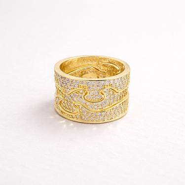 Miki Ring gold pavé multi band ring with three detachable bands stacked together as one, featuring zirconia stones on a soft neutral background