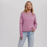 Lavender knit sweater with crocheted neckline, modeled with light denim — Minkoff Sweater by Matte.