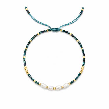 Morrath Bracelet in a teal beaded colorway featuring polished beads, freshwater pearl accents, gold-tone details, and an adjustable sliding cord closure.