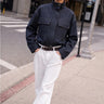 Murish Jacket styled with white pants, front view.