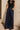 Murish Trouser dark indigo high-rise wide-leg pants, front view.