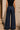 Murish Trouser dark indigo wide-leg pants, back view.