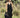 Model wearing black stretch Neir Jumpsuit with v neckline and elastic waist — Matte Concept Store