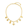 A gold-plated necklace with multiple charms including a heart, a star, and other geometric shapes. Nia necklace by Matte, 15-inch gold plated chain with 5.5-inch extender on neutral background