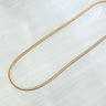 Noa necklace by Matte, gold plated flat herringbone chain on white background