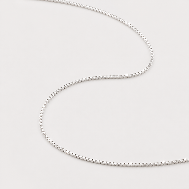 Nolia Necklace silver box chain necklace displayed on neutral background.