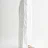 Octavia Jeans – white denim jeans, side view with relaxed silhouette.