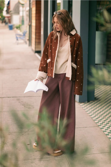Front angled view of the Oddet Pant showing its relaxed wide-leg fit and fluid drape.