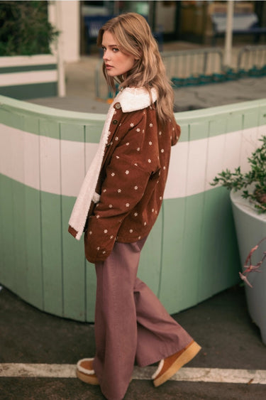 Back view of the Oddet Pant showing its relaxed fit and full-length wide-leg design.