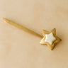 Oksana Hair Clip — gold hair barrette with star accent on neutral background.