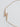 Olite necklace by Matte, gold plated lightning bolt pendant on white background