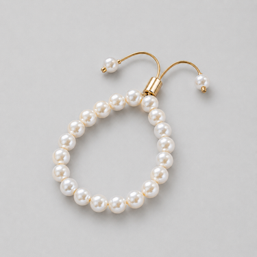 Orient Bracelet pearl bracelet on neutral background, showing adjustable closure and oversized pearl design.