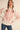 Paloma Embroidered Blouse by Matte – ivory blouse with red floral embroidery, collared neckline and puff sleeves, front view.