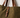 Pampa Tote Bag close-up showing leather strap detail and textured fabric finish with warm brown accents