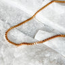 Plano Necklace by Matte, gold filled box chain choker on white marble surface