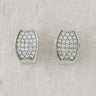 Front view of silver pavé huggies on linen backdrop, Plex Huggie Earrings.