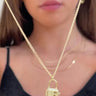 model wearing eryx padlock necklace