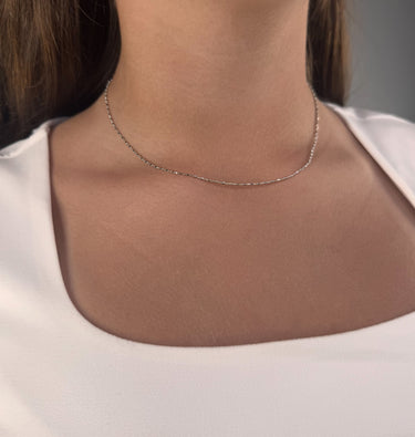 Model wearing Recife silver chain necklace by Matte, subtle everyday jewelry