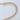 Detail of Reek bracelet gold plated links with clear stones