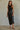 Regi Top styled with satin black skirt for elevated evening look.