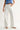 Relic Embroidered Denim Pants – white high-rise straight-leg jeans with embroidered detailing, front view on model.