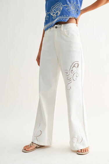 Relic Embroidered Denim Pants – angled front view showing clean white denim and cutwork detail.