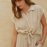 Rita Shirt textured cream striped blouse with adjustable tie-front detail.