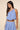 Ritzi Blouse blue striped cropped top worn with matching skirt, showing flowy silhouette and relaxed fit