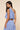 Ritzi Blouse side view of blue striped one shoulder top with lightweight fabric and cropped design